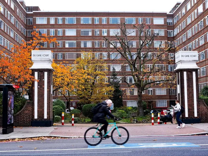 The gates and Art Deco block of Du Cane Court on Balham High Road