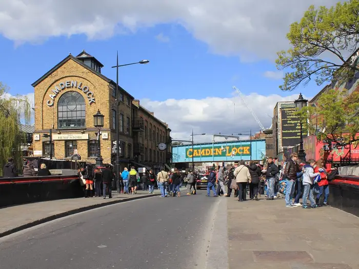 Camden Lock market building and bridge sign on Camden High Street / Chalk Farm Road