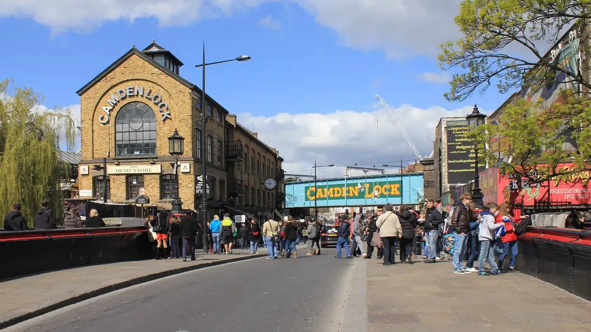 Camden Lock market building and bridge sign on Camden High Street / Chalk Farm Road