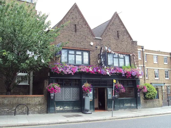 A pub hung with flower baskets on Church Street, Edmonton