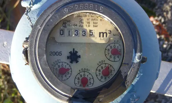 Close-up of a water meter dial