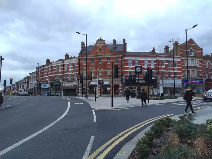 The Triangle, Palmers Green, with its clock and Victorian buildings on Green Lanes
