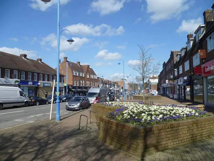Shopping parade and flower beds in Potters Bar town centre
