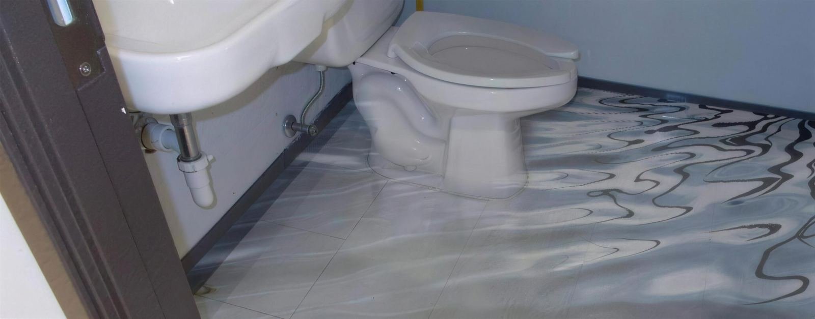 Overflowing toilet in Manchester